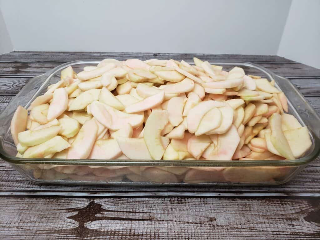 apples piled high in baking pan