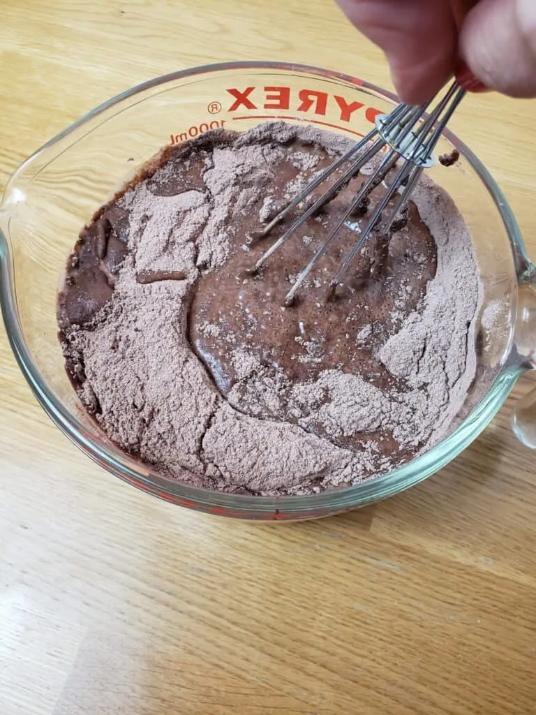 mixing milk with chocolate pudding mix