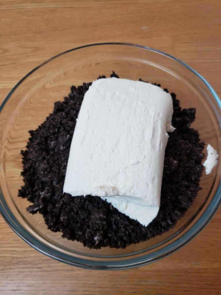 cream cheese and crushed oreos in bowl