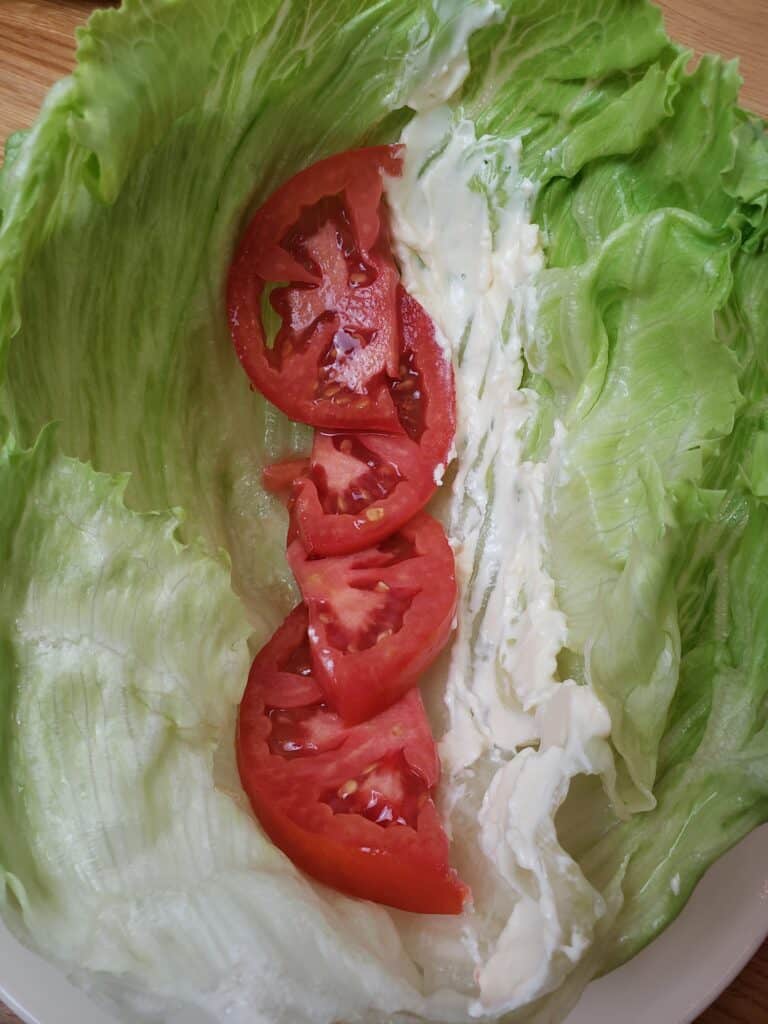 tomato and mayo in lettuce leaves