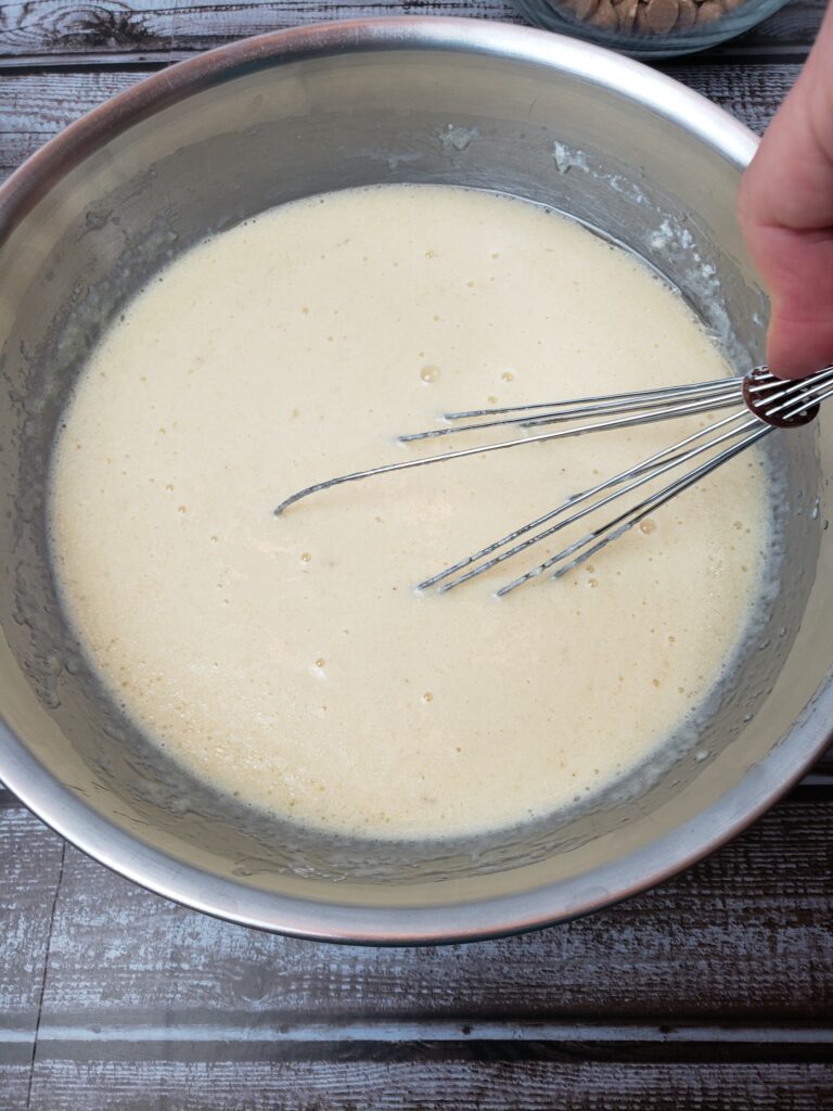 mixing wet ingredients together with whisk