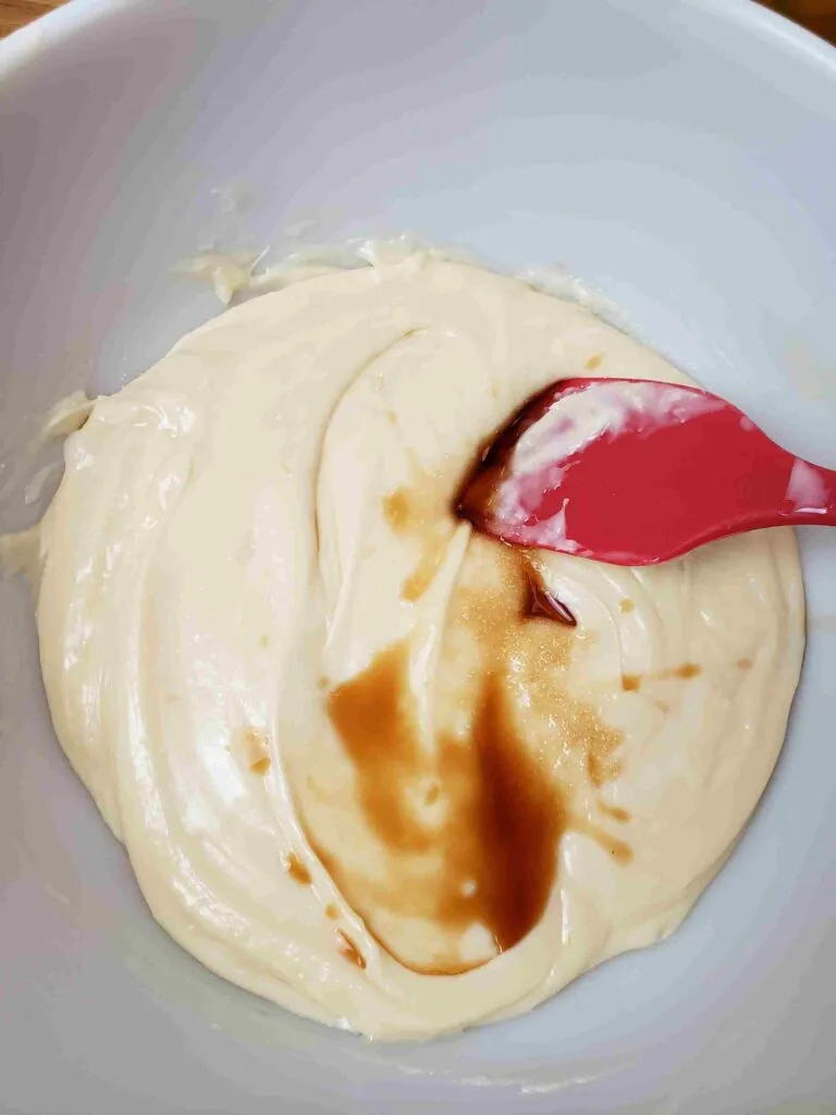 adding vanilla and salt to melted chips and milk