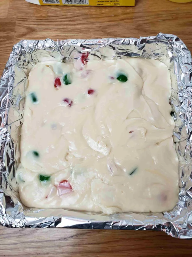 gumdrop fudge spread into a foil lined pan