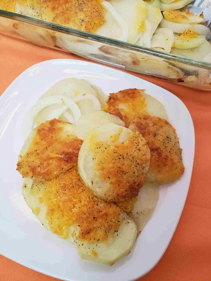 cheesy potato rounds on serving plate