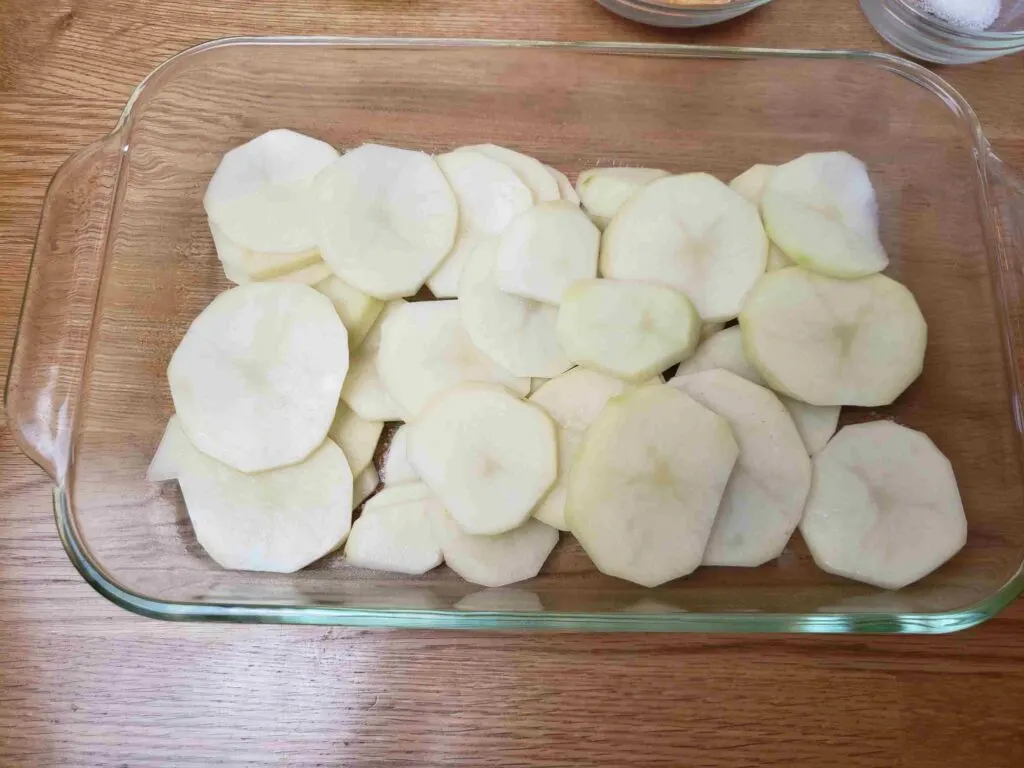 sliced potatoes in baking dish