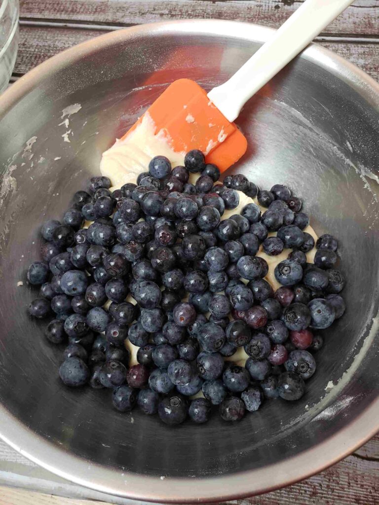 folding in blueberries