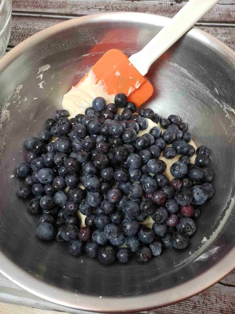 folding in blueberries