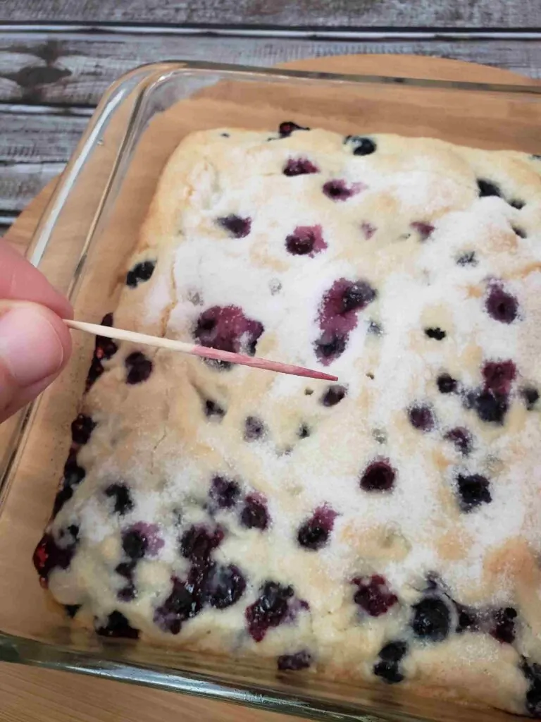 testing coffee cake with toothpick