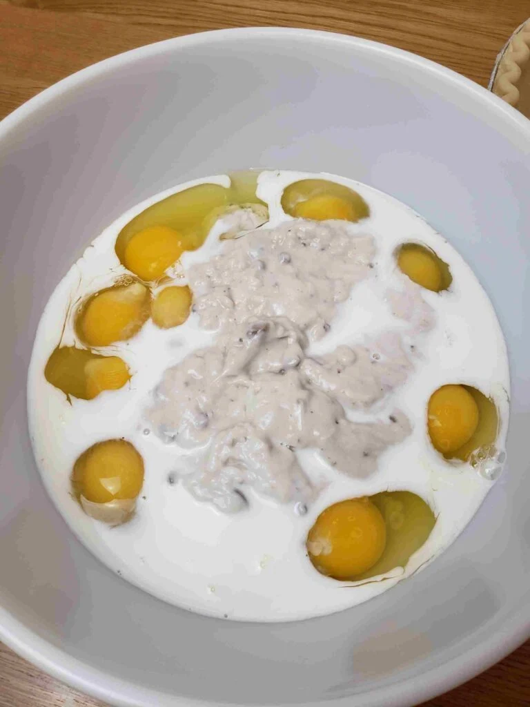 eggs, milk and soup in mixing bowl